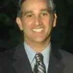 headshot_-jpeg-scaled-qnaogefx8jb0nfe8sq4npofqsiqzmc1d53rp7cyqi8.webp
